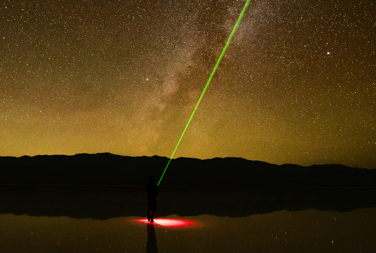 Green Laser in Night Sky